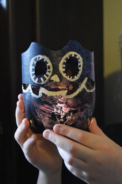 Photo of a DIY owl lamp made out of a plastic bottle.
