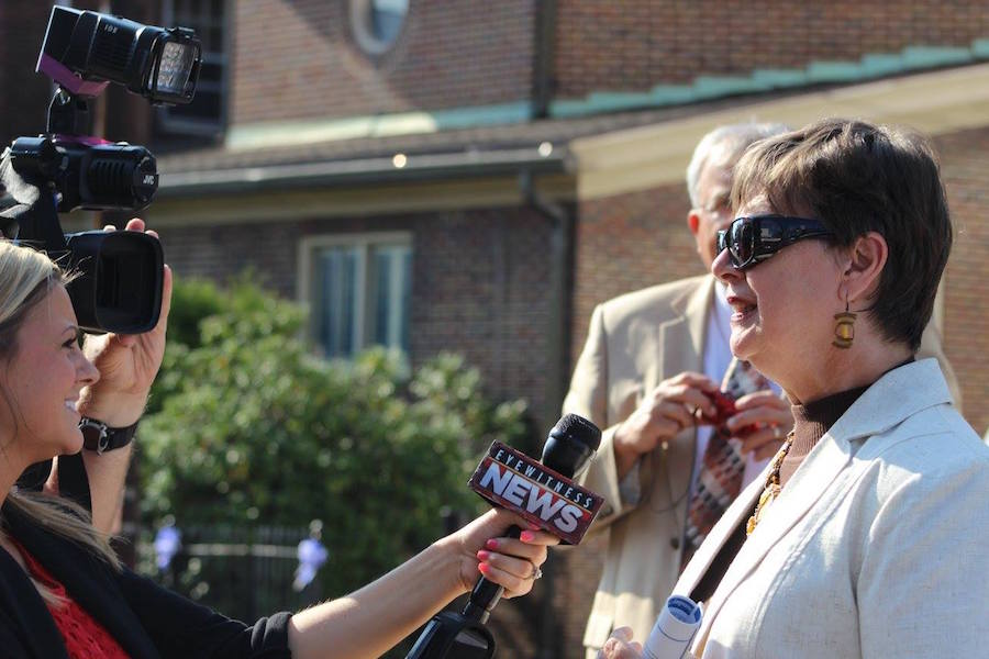 Photo by Debbie Walker of a local resident being interviewed by WBRE-TV about the canonization of Saint Teresa.